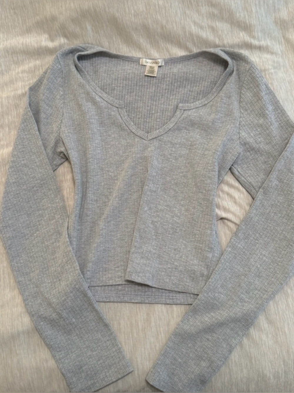 grey knotched long sleeve top